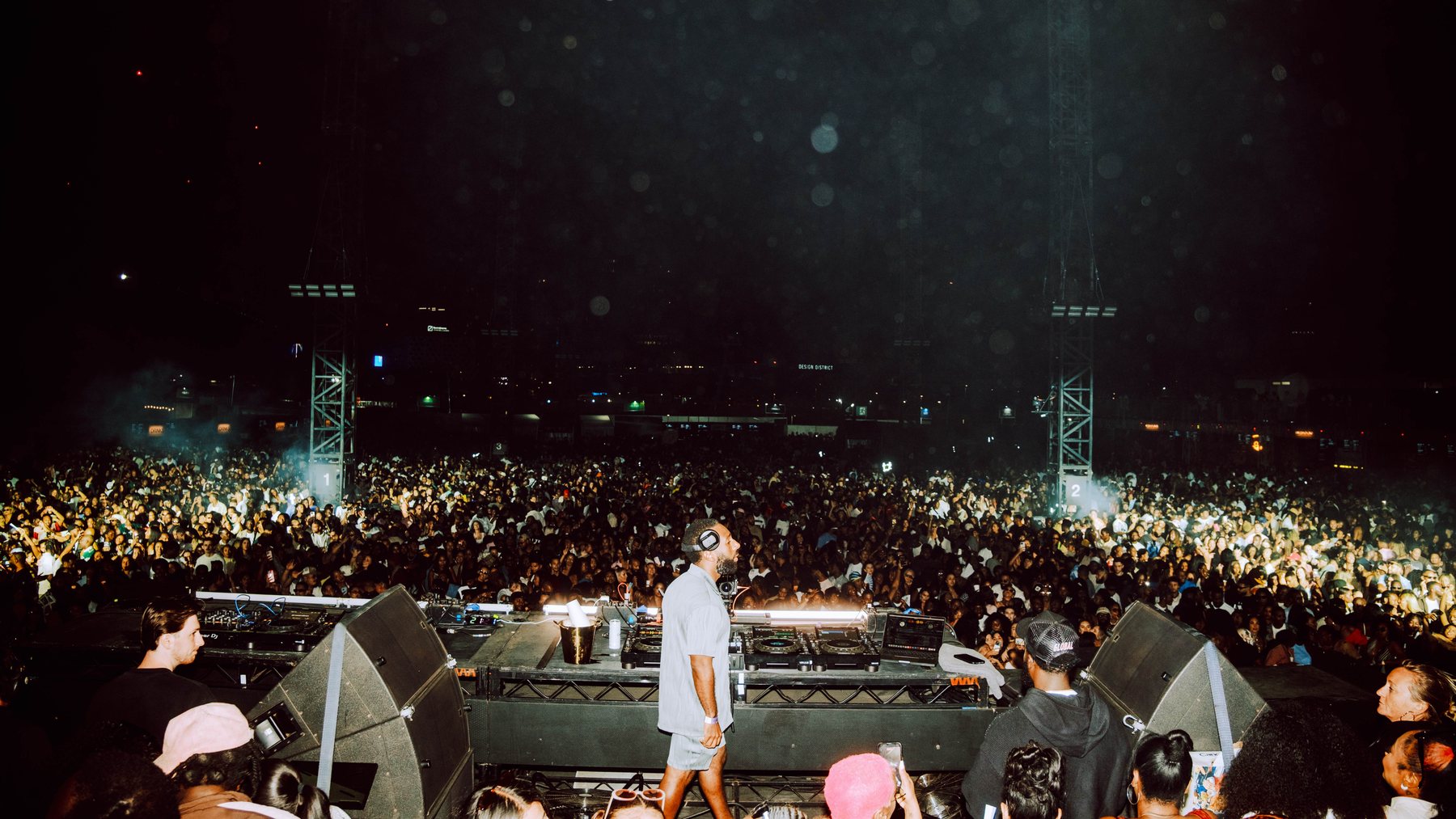 Wide view from the stage over the R&B Slow Jams crowd at night.